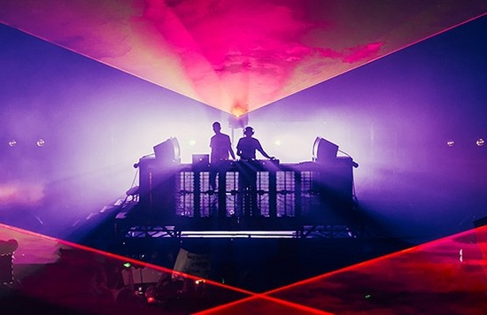 djs perform on stage