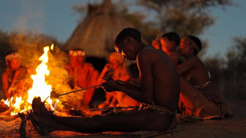 brent stirton capturing a namibian male sharpning his arrow shot on the Canon EOS R & RF 50mm F1.2L USM