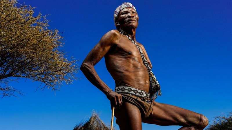Brent Stirton capturing a namibian male standing behind dark blue sky shot on the Canon EOS R & RF 50mm F1.2L USM