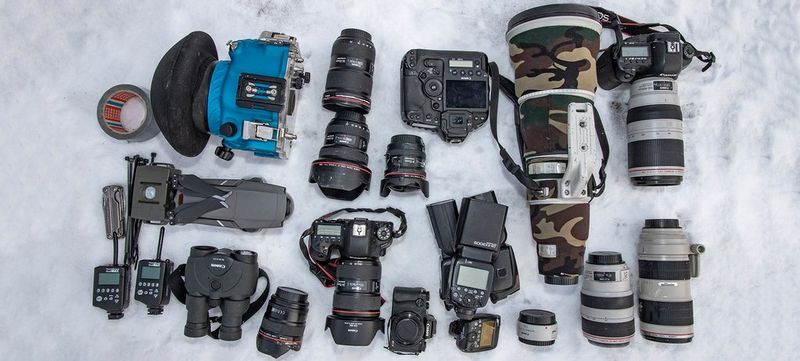 Audun Rikarden's kitbag containing Canon cameras and lenses.