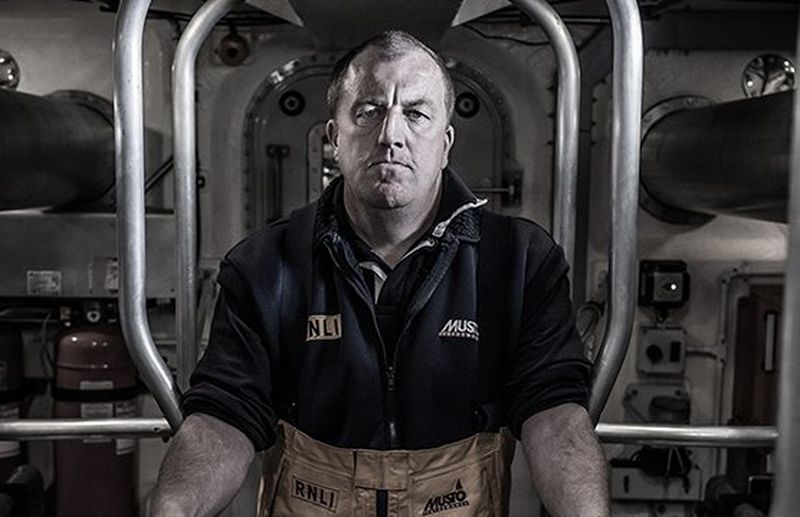 people wait at station