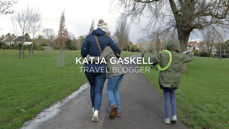 A child runs in the garden, holding a streamer that waves behind him. Taken on a Canon EOS M50 by Katja Gaskell.