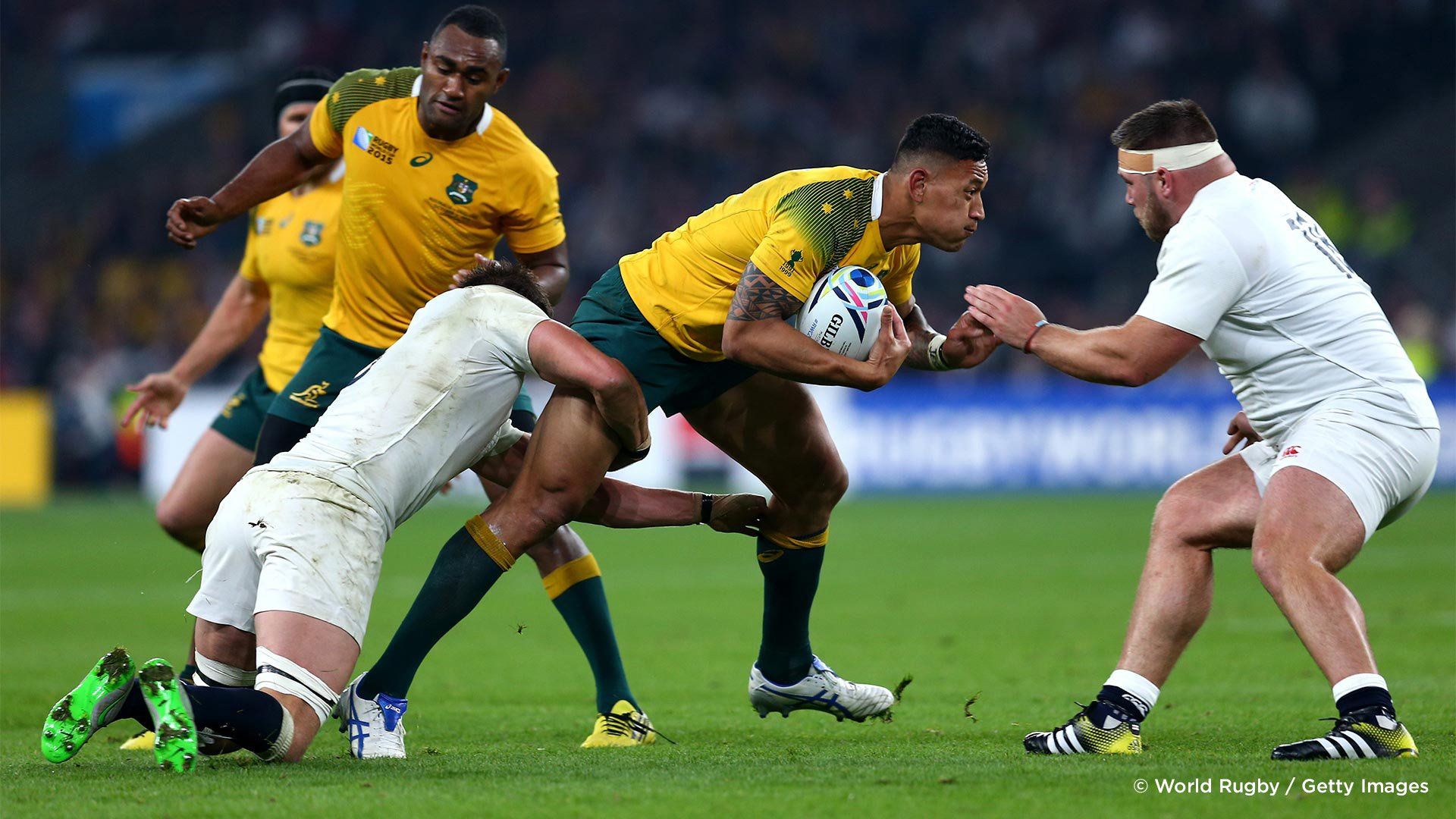 Players pictured on the point of a tackle in a match between England and Australia in the 2015 Rugby World Cup. Photo by Steve Bardens.
