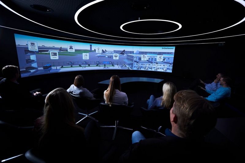 A panoramic shot of a video being projected onto the presentation wall.