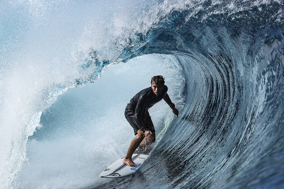 Surfer Kauli Vaast surfs inside the barrel of a wave. Taken by Ben Thouard on a Canon EOS-1D X Mark III.