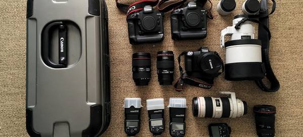 Christian Ziegler's kitbag, including two Canon EOS-1D X Mark II bodies and an EOS R.