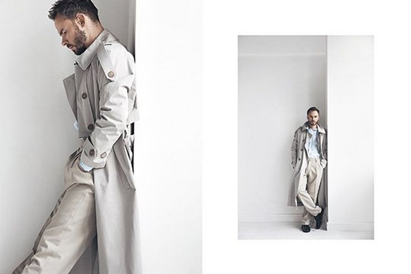 A male model wears a white coat and stands against a white wall in two shots by fashion photographer Jaroslav Monchak. Shot on a Canon EOS 5DS R with Canon EF 24-70mm f/2.8L II USM lens.