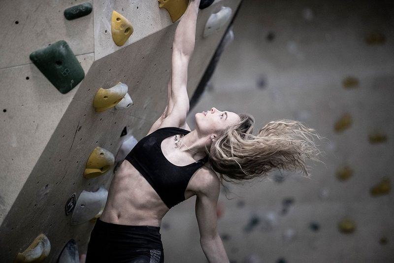 Premium Photo  Outdoor shot of young female athlete flexing