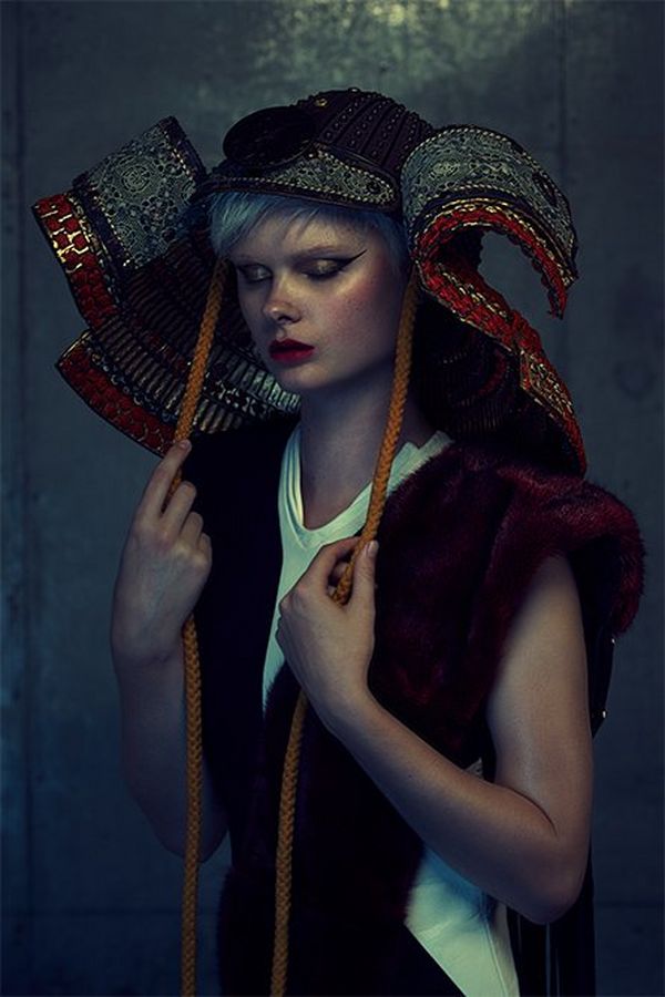 A blonde model wearing an elaborately embroidered Japanese Kabuto style headdress. Photographed by Quentin Caffier on a Canon EOS-1D X.