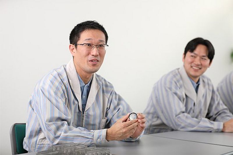 Two of the developers of the Canon RF 85mm F1.2L USM lens.