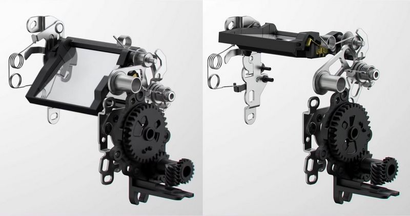 The mirror mechanism from a DSLR, shown with the mirror down and then raised.