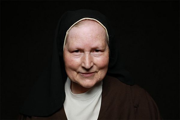 An Irish nun wears a traditional black habit.