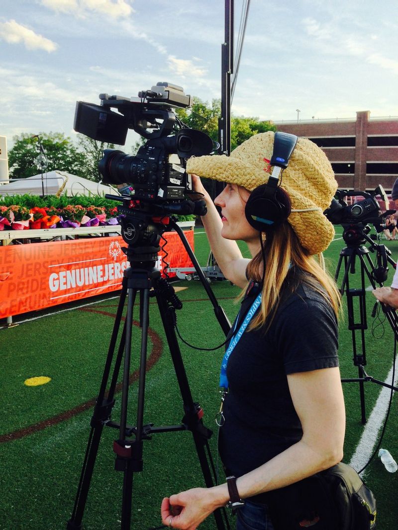 Cinematographer Laela Kilbourn operating a video camera. 