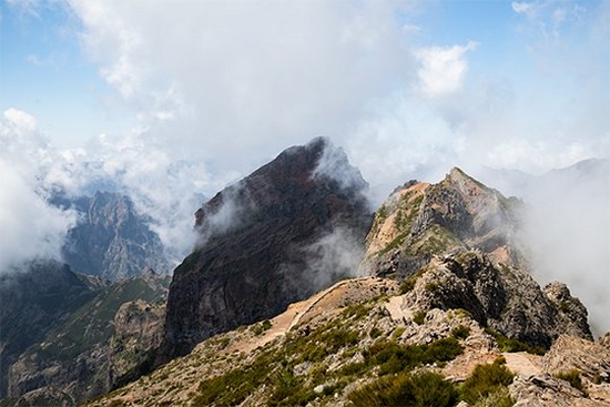 Misty mountaintops in Madeira. Photo by Michaela Nagyidaiov on a Canon EOS 6D Mark II with a Canon EF 24-70mm f/4L IS USM lens.