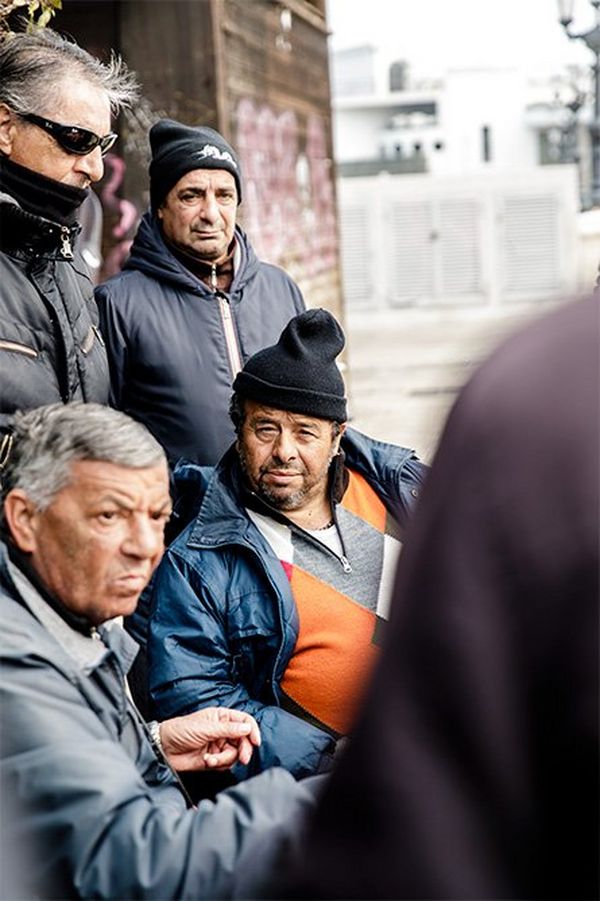 Italian men in a travel street scene. Photo by Annapurna Mellor with a Canon EF 24-70mm f/2.8L II USM.