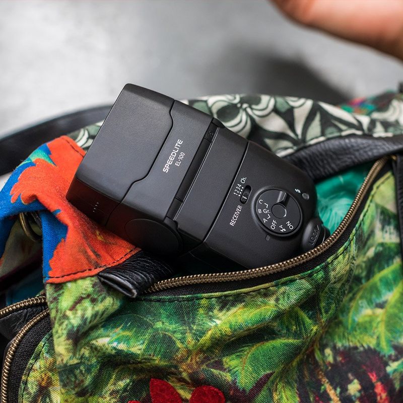 Canon Speedlite EL-100 packed into a floral bag