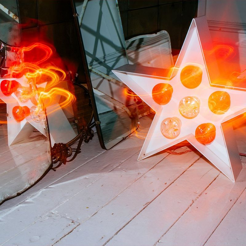 Decorative star and light trails shot using the Canon Speedlite EL-100