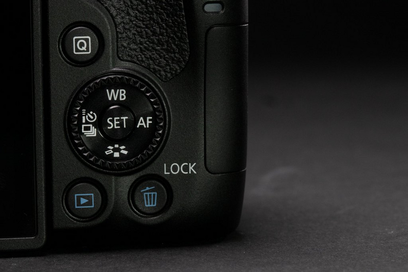 Canon EOS 850D back studio shot displaying the control dial