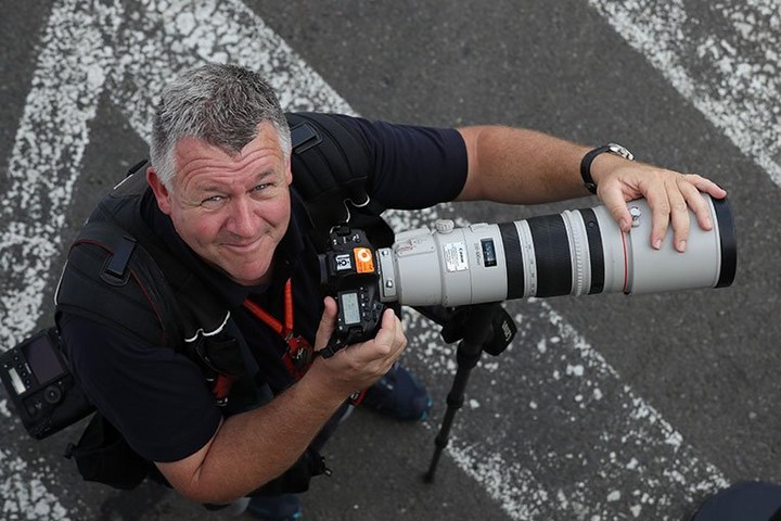 A CPS member looking pleased with his Canon photography equipment