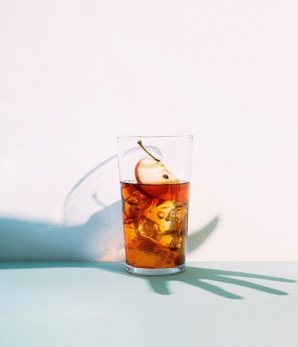 A glass of cider and ice forms a still life shot, accessorised with the artist’s shadow as Felicity McCabe overlays the shape of her hand over the drink.