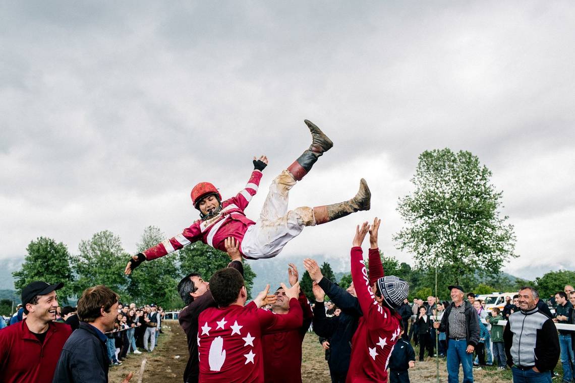 Etluhov Islam celebrates his victory in the horse racing. Important national sports such as this take place twice a year in Abkhazia, on 9 May and 30 September.