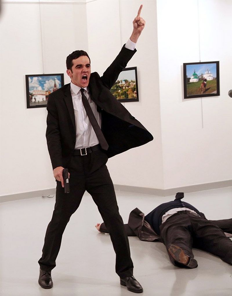 Burhan Ozbilici captures police officer Mevlüt Mert Altıntaş shouting after shooting Andrey Karlov, the Russian ambassador to Turkey.