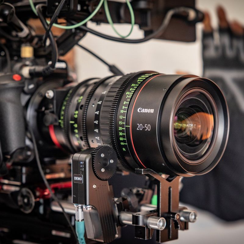 A close-up of the Canon CN-E20-50mm T2.4 L F / FP lens attached to a Canon EOS C500 Mark II camera.