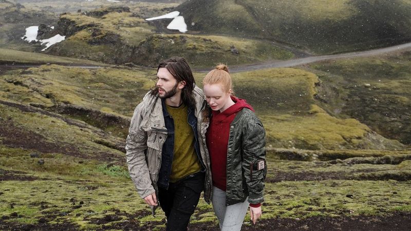 Couple walking up green hill side shot on the Canon EOS R & RF 24-105mm F4L IS USM