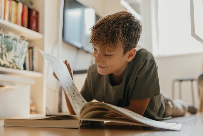 person looking through a digitally printed book