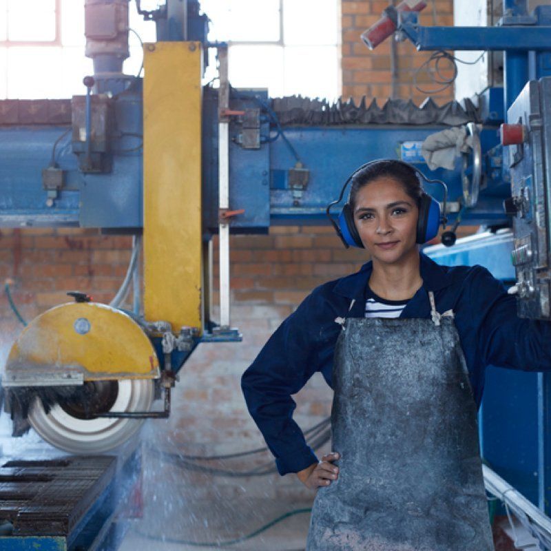 Woman standing in a factory