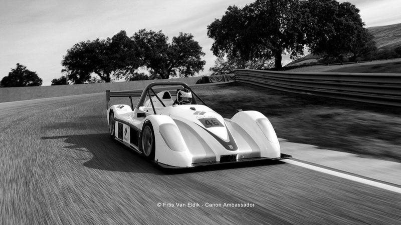 racecar speeds around track