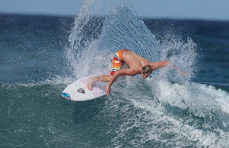 surfer riding the waves