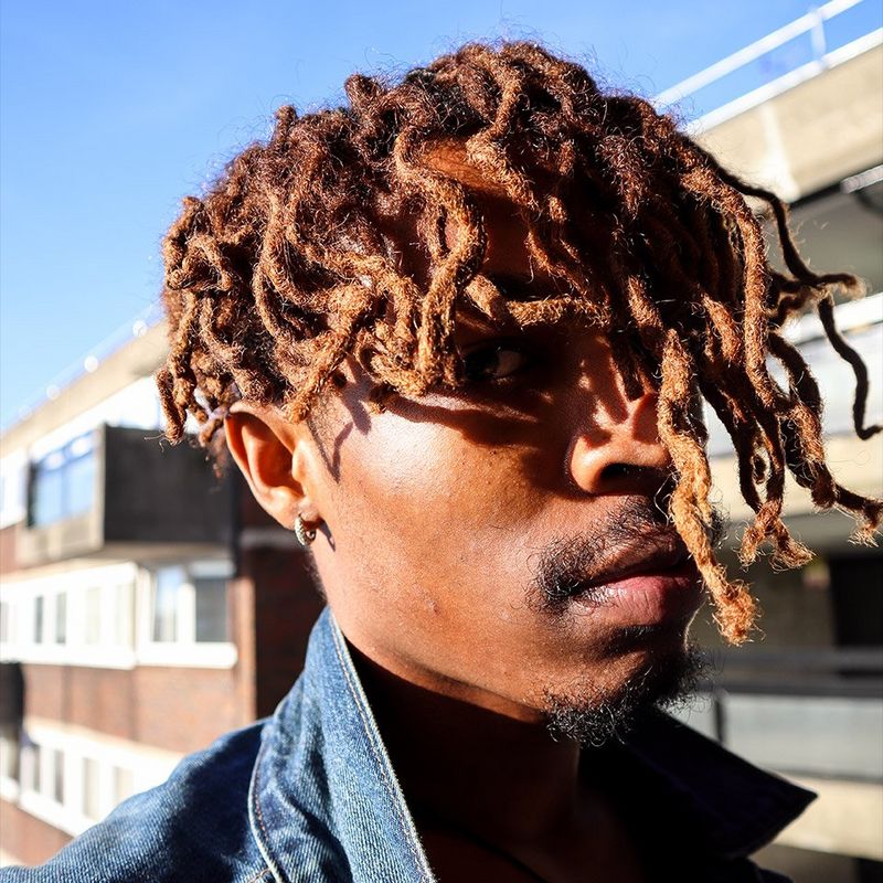 Close up of man with dreadlocks shot on the Canon EOS M50