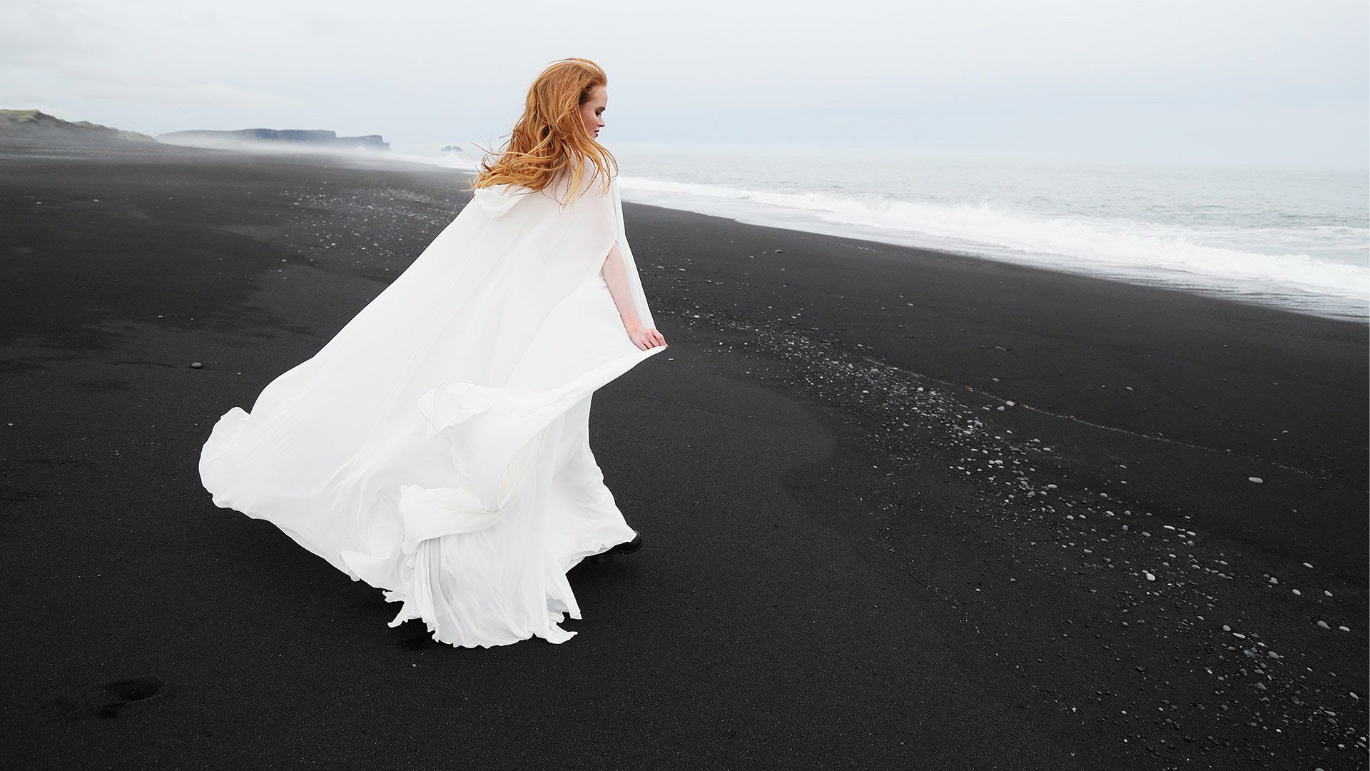 Female in wedding dress on Iceland beach shot using Canon EOS R and RF 24-105mm f/4L IS USM