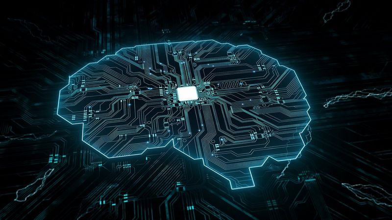 The shape of a brain, illustrated using a blue circuit board design on a black background.
