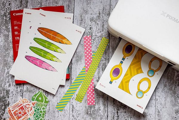 A Creative Park template emerging from a Canon printer.