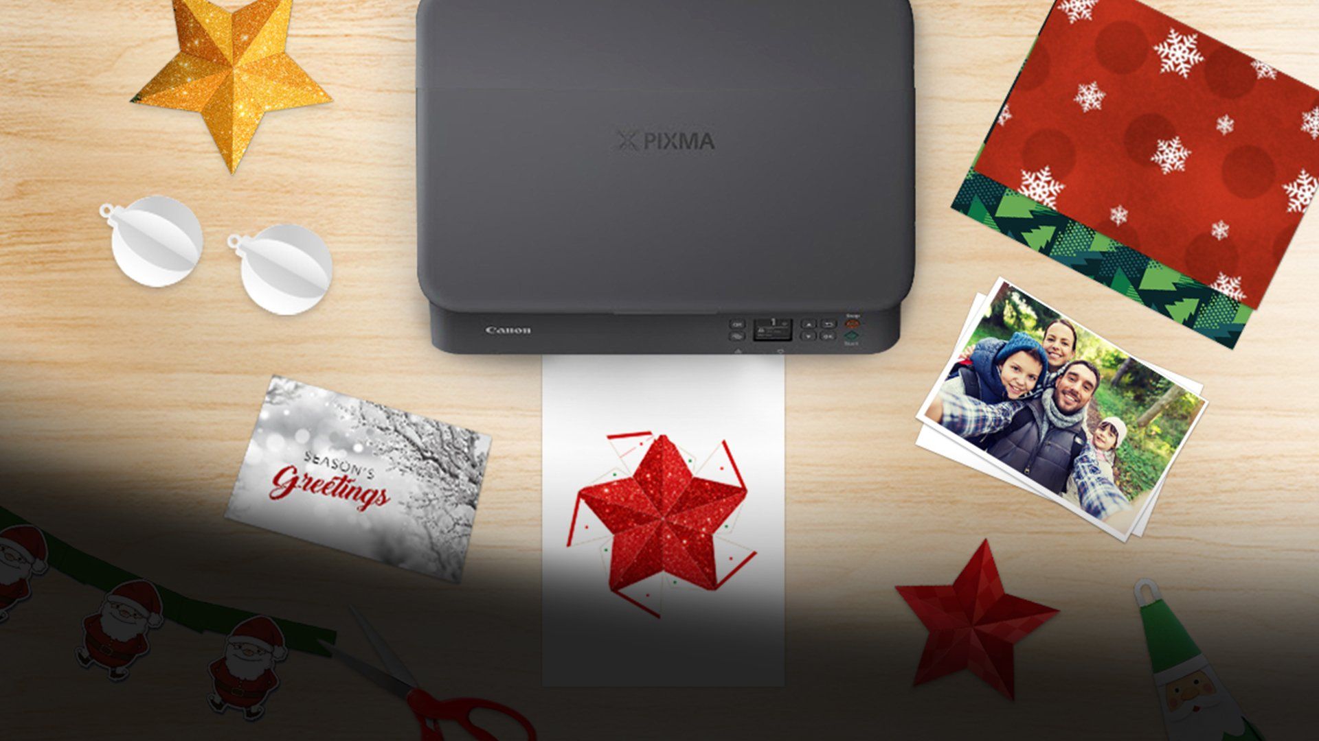 PIXMA printer on a table surrounded by festive season ideas