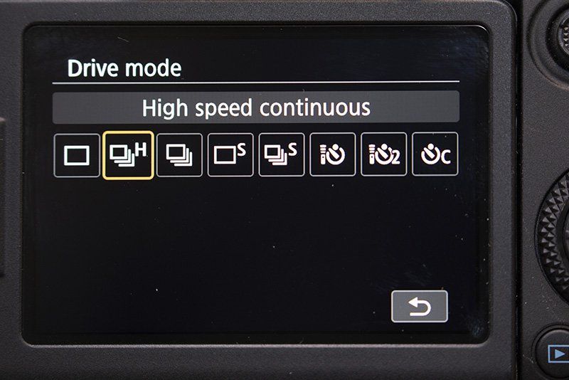 The back of a Canon EOS 90D showing high speed continuous shooting settings.