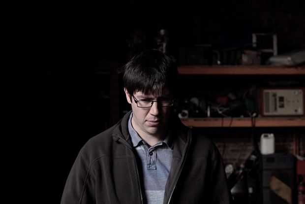 Shot from video Robot Man with the subject named Alan standing in front of the camera.