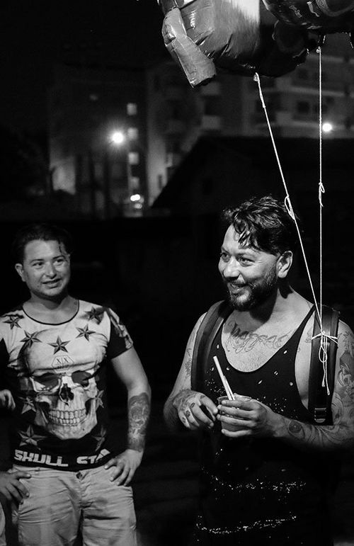 Low light candid of gypsy men with EOS 5D Mark IV
