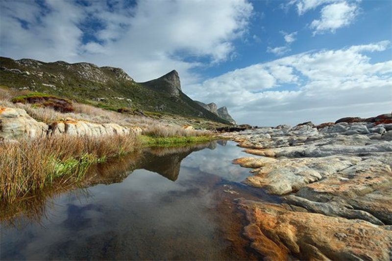 Scenic view of mountains and clouds