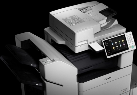 Canon multifunction printer for offices, with scanner, copier and large colour touchscreen.