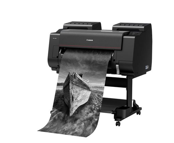 A Canon imagePROGRAF PRO-2000 printer outputting an image of a boat.