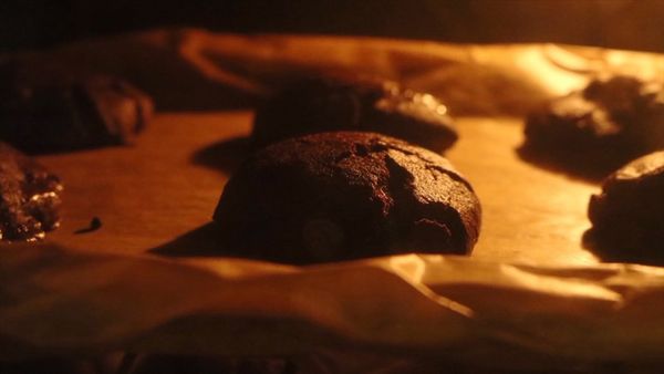 A composite image: left, the back of the Canon EOS 90D showing the interval shooting settings; right, a cookie rising in an oven.