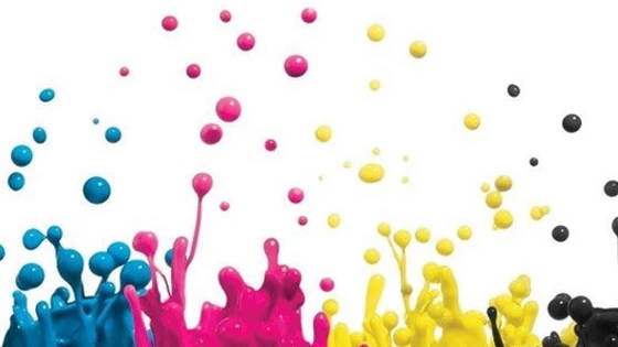 Blue, pink, yellow, and black ink splashes
