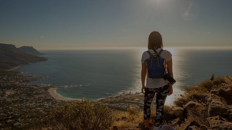 Jitka with Canon EOS RP on cliff overlooking sea