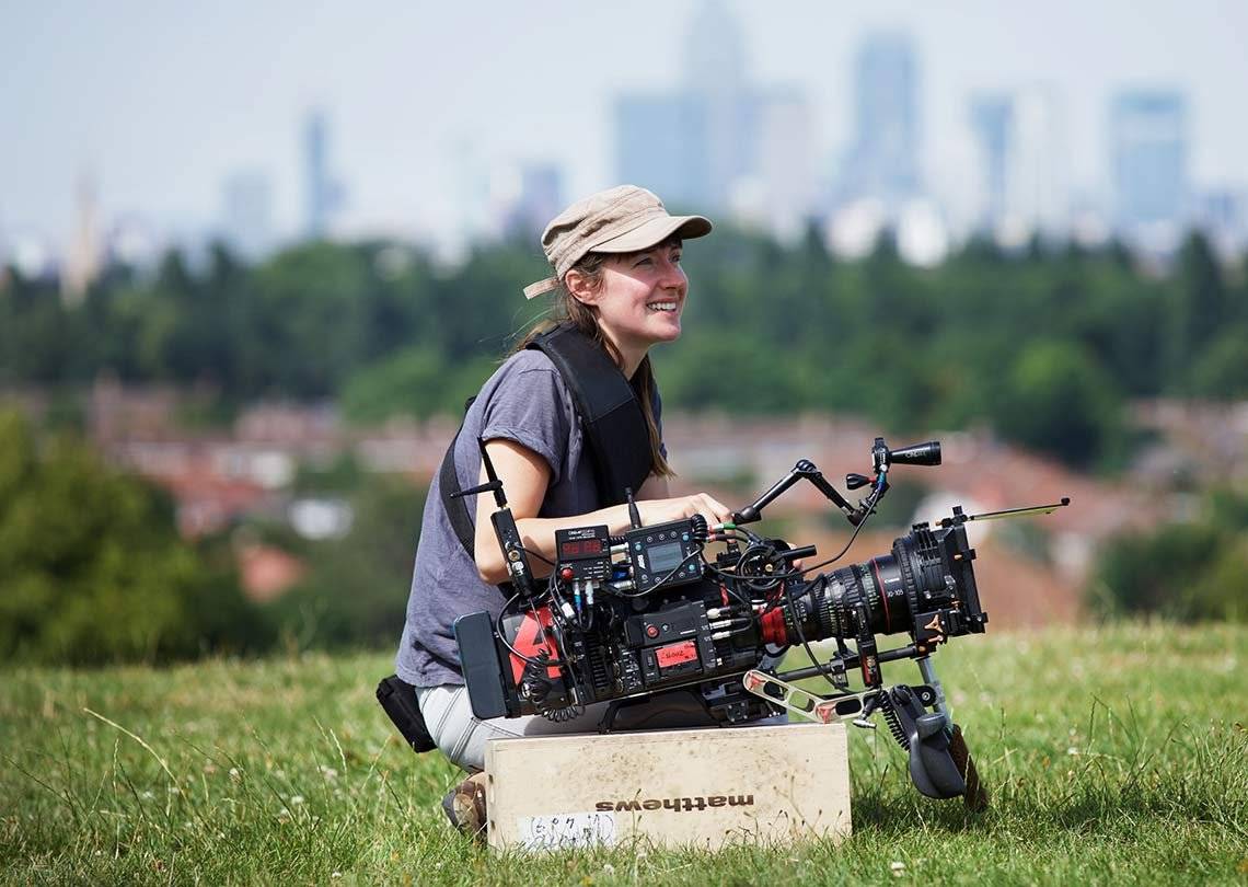 Female cinematographer Laura Bellingham on the set of Stump, with the EOS C700 in front of her.
