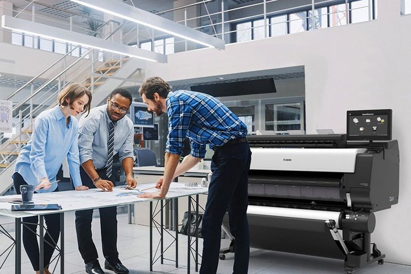 Lifestyle image in workspace environment showing TZ-4200 MFP.