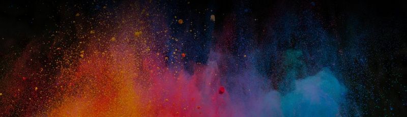 An inspiring image showing a rainbow of colours in the form of powder