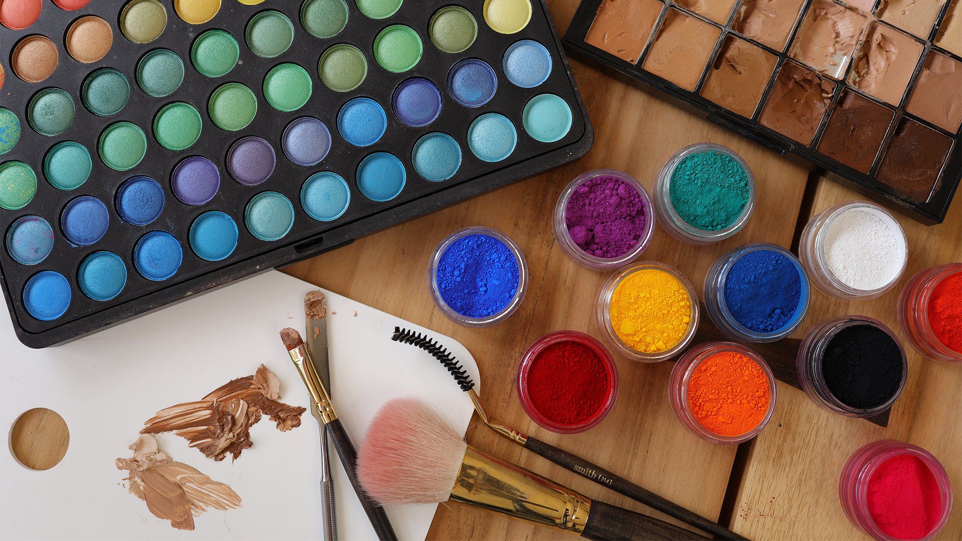 Multiple colours of watercolours with makeup brushes shot on the Canon RF 35mm F1.8 MACRO IS STM